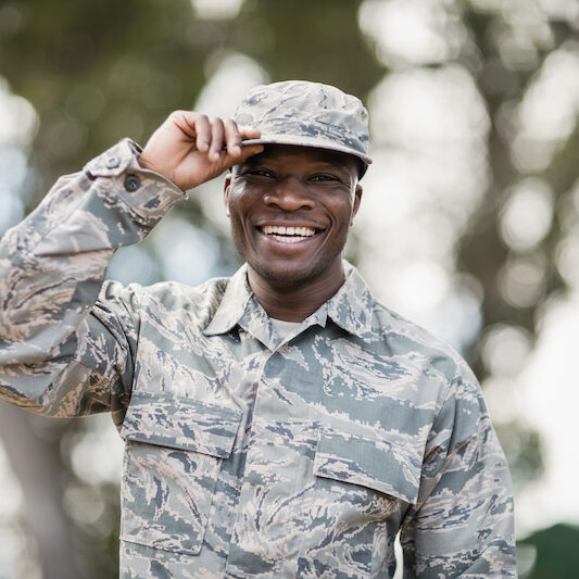 Portrait of happy military soldier in boot camp